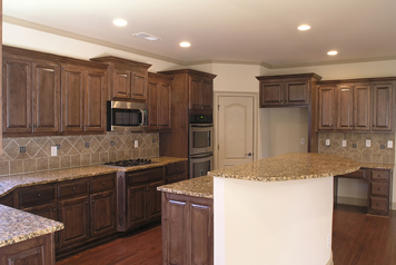 Kitchen cabinets and countertops by Marble & Granite Works in Metro Detroit